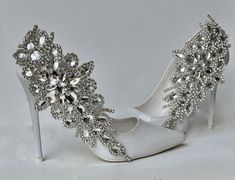 Listing is for the shoe clips NOT the shoes.  Stunning wedding accessory for shoes make any ordinary pair of shoes look like they are worth hundreds! The pair of bridal shoe clips attach easily, comfortably and firmly to any pair of shoes.  They measure 10 x 4. inches. Luxury Wedding Shoes With Crystal Embellishments For Reception, Luxury White Embellished Wedding Shoes, Luxury Silver Wedding Shoes With Crystal Embellishments, Glamorous White Wedding Shoe Clips, Fancy Wedding Shoes, Shoes For The Bride, Glamorous Crystal-embellished Wedding Shoes, Whimsical Shoes, Rhinestone Wedding Shoes