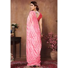 Pink colored saree is made from georgette fabric which is highlighted with printed & lace border work as shown. comes along with banglori silk blouse piece which you can customise as per your design/style. Occasion - You can wear this saree for parties, functions and events. Note:- the actual product may differ slightly in color and design from the one illustrated in the images when compared with computer or mobile screen. Measurements: Saree : Georgette : 5.5 Mtrs Blouse : Georgette : 0.8 Mtr M Festive Fitted Pre-draped Saree With Printed Border, Festival Georgette Pre-draped Saree With Printed Border, Pink Blouse Piece With Bandhani Print In Traditional Drape, Georgette Saree With Bandhani Print In Traditional Drape, Georgette Saree With Bandhani Print, Pink Blouse Piece With Bandhani Print, Pink Bandhani Print Blouse Piece, Navratri Chiffon Saree With Pallu Detail, Navratri Chiffon Saree With Pallu