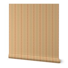 an orange and beige striped wallpaper with small dots on the bottom half of it