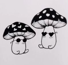 two black and white mushrooms with hearts on their faces are sitting side by side in front of each other