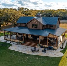 an aerial view of a large house in the country