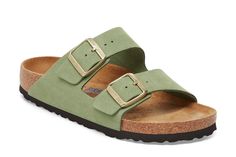 Birkenstock women's Arizona soft footbed sandal. Two-strap elegant sandal with soft insole for extra comfort. Suede leather upper slide. Suede lining and EVA outsole. Made In Germany. Birkenstock footwear is manufactured in two widths: regular and narrow. Narrow width is designed to accommodate an A-B width for women and fits more like a medium than a true narrow. Summer Green Footbed Sandals With Leather Footbed, Green Leather Footbed Sandals For Summer, Green Open Toe Footbed Sandals With Buckle Closure, Green Open Toe Footbed Sandals With Removable Insole, Green Leather Open Toe Footbed Sandals, Green Leather Footbed Sandals For Beach, Green Leather Footbed Sandals With Cushioned Footbed, Spring Leather Footbed Double Strap Sandals, Comfortable Open Toe Leather Footbed Sandals