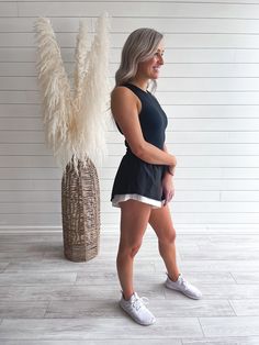 A cropped, round neckline, sleeveless tank top. 76% Nylon, 24% Spandex runs small, go up one size. Model is wearing a medium. (38” bust, 30” waist, 37” hips, 5’4”) Athleisure Shorts, Beach Boho, Get Moving, Crowd Pleaser, Go Up, Boho Beach, Beach Babe, Sleeveless Tank Top, Sleeveless Tank