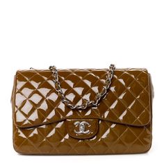 This is an authentic CHANEL Patent Quilted Jumbo Single Flap in Brown. This chic shoulder bag is crafted of diamond quilted patent leather in brown. The bag features silver chainlink leather-threaded shoulder straps and a classic silver CC turn lock on the front flap.  This opens to a brown leather interior with zipper and patch pockets. Chocolate Brown Chanel Bag, Brown Chanel Bag, Brown Chanel, Diamond Quilt, Classic Flap, Leather Interior, Chanel Classic Flap, Chanel Bag, Chanel Classic