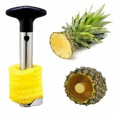 a pineapple peeler is next to a cut in half pineapple and another piece of fruit