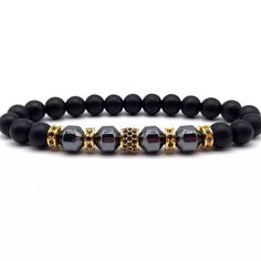 Elevate Your Style With This Sleek Matte Black Bracelet Accented With Eye-Catching Hematite And Rhinestone Charms - An Elegant Piece To Add To Your Collection Of Accessories! Size: 19cm-21cm Flexible Elastic Cord 8mm Round Beads Tags: Men’s, Unisex, Fashion, Gentleman, Luxury, Gq Style, Modern, Chic, Dapper, Dandy, Groom, Groomsmen, Boss Life, Father’s Day, Dad, Mother’s Day, Mom, Gift For Him, Gift For Her, Valentine, Christmas Gift, Present, Stocking Stuffer, Gun Metal, Graphite, Crystals Elegant Black Beaded Crystal Bracelet, Adjustable Black Beaded Bracelets With Stones, Elegant Black Beaded Stretch Bracelet, Mens Bracelet Designs, Gold Charm Bracelet, Chakra Bracelet, Mens Leather Bracelet, Black Bracelets, Mens Beaded Bracelets