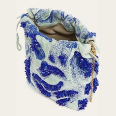 Dries Van Noten bead-embellished bucket bag in leather, viscose, and silk Detachable chain shoulder strap Drawstring top closure Approx. 9.0"H x 8.2"W x 3.5"D Imported Luxury Embellished Potli Bag For Evening, Blue Top Handle Bucket Bag For Evening, Blue Bucket Bag With Detachable Handle For Evening, Evening Blue Bucket Bag With Detachable Handle, Blue Evening Bucket Bag With Detachable Handle, Spring Evening Bucket Bag With Top Handle, Luxury Party Bucket Bag With Chain Strap, Designer Bucket Bag For Party, Chic Evening Bucket Bag With Pearl Handle