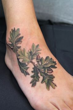 Oak branch with two acorns tattoo on a feet Oak And Acorn Tattoo, Red Oak Tattoo, Oak Leaf Acorn Tattoo, White Oak Tree Tattoo, Live Oak Tattoo, Yew Tree Tattoo, Oak Branch Tattoo, Acorns Tattoo, Oak Tree Leaf Tattoo