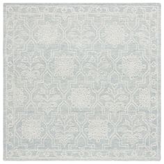 an area rug in light blue and white