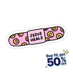 a pink sticker that says jesus heals with smiley faces and stars on it