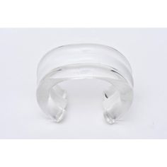 This is part of Chairish’s Costume Jewelry assortment.  The bands of clear, white and then clear again make this very chic chunky lucite cuff bracelet from the 80's so wearable and fun! It is designed by a famous Californian artist named Judith Hendler who worked in plastic jewelry at the time. This will take a wrist that is 6.5" or 7" W. It is timeless and simple. The interior diameter of the cuff is 2.25". The opening at the back of the cuff is 1.5" W. Please note: we have a wonderful collar s Modern Adjustable White Bangle, Modern White Bangle For Formal Occasion, Modern White Cuff Bracelet, Modern Lucite Bangle Jewelry, Modern White Lucite Jewelry, Modern Clear Bracelet Jewelry, Sculptural Necklace, Plastic Jewelry, Resort Wear