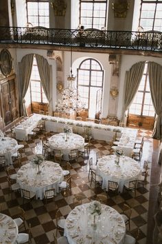 an overhead view of a banquet hall with tables and chairs set up for formal function