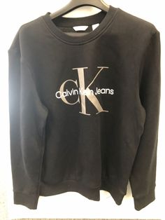 View More Calvin Klein Items   Calvin Klein Men’s Monogram Logo Crewneck Sweatshirt, Medium Calvin Klein Men's Monogram Logo Crewneck Sweatshirt, White, Medium Retro-inspired monogram logo for an iconic look Plush cotton knit blend for super soft, loungewear comfort Crewneck and long sleeves Ribbed knit trim for a snug fit Model is approximately 6'1" wearing size Medium   Shipping Details Payment Information Customer Service Shipping Cost We generally ship FREE in USA, otherwise please look item shipping info. For international buyers we welcome combining. Delivery Time We generally ship same business day, expedite shipping if otherwise stated. International Buyers Import duties, taxes, and charges are not included in the item price or shipping cost. These charges are the buyer's responsib S Monogram Logo, Calvin Klein Sweatshirt, Mens Monogram, Monogram Sweatshirt, S Monogram, Sweatshirt White, Calvin Klein Men, Monogram Logo, Cotton Knit