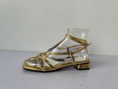 Resin Material Sandals Display Plexi Transparent Female Mannequin Foot Form AF-1 1. material: resin 2. size: 37 3.style: open toes/closed toes 4.color: clear, transparent with resin material, with time going on, it will be turn yellow. the time is about 1 year. if you do care, please don't buy. it will not change the transparency, but you can see little bit yellow with the light. 5. functions: it's good for all styles flips-flops, sandals display. perfect summer season store display prop. 5. shi Gold Jelly Sandals With Round Toe For Spring, Gold Jelly Sandals For Spring Party, Gold Heels With Clear Strap For Evening, Gold Jelly Sandals For Party With Round Toe, Gold Jelly Sandals With Round Toe For Party, Child Mannequin, Display Props, Hat Display, Shoe Display