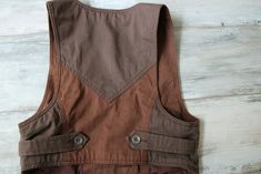 DIESEL Womens Vest Two Tone Brown Waistcoat M/L Size > Tag : Diesel > 100% Cotton > Lining : 100% Polyester > Label size is L, but looks smaller, see measurements NOTE : Actual colors may vary. This is due to the fact that each monitor has different possibilities for displaying colors and that everyone sees these colors in their own way. Great Vintage Condition Measurements (laying flat) : Length : 46 cm / 18.1'' (front) Length : 38 cm / 15'' (back) Armpit to armpit : 42 cm / 16.5'' Brown Cotton Vest With Button Closure, Cotton Vest With Patch Pockets For Fall, Brown Utility Vest For Fall, Cotton Vest With Pockets For Workwear, Brown Cotton Vest Outerwear, Brown Cotton Vest For Outdoor Use, Brown Cotton Vest For Outdoor Activities, Brown Cotton Vest For Fall, Fall Cotton Vest With Side Pockets