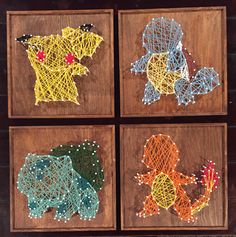 four different colored string art pictures on wood