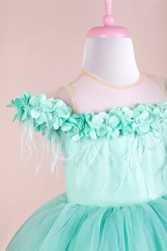 Details Fabric: Satin fabric, 3D flower, dream tulle, cotton lining 3D floral dress in mint green Cap sleeve Illusion collar Mint green 3D flower and ostrich feather on the shoulder from front to back Upper part made of mint green satin Front and back of the skirt decorated with 3D flowers Knee-length skirt Tulle layered skirt Hair accessory included Suggestions for the use of Violet Tiffany Party Dress Special design girls dress for special parties Special costume dress in the concept of flower 3d Floral Dress, Tiffany Blue Dress, Tulle Layered Skirt, Tiffany Dresses, Tiffany Party, Skirt Tulle, Green Cap, Neckline Designs, First Birthday Outfits