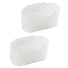 two white plastic containers sitting next to each other