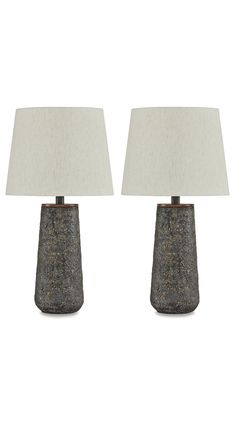 two lamps with white linen shades on them