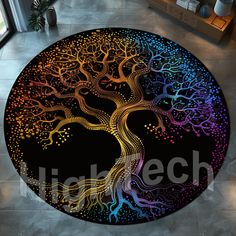 a round rug with a colorful tree on it