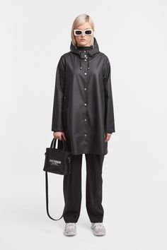 Mosebacke Lightweight Raincoat Black | STUTTERHEIM US Winter Raincoat With Button Closure, Black Hooded Raincoat For Work, Black Raincoat With Detachable Hood For Rainy Weather, Black Raincoat With Drawstring Hood For Rainy Weather, Black Raincoat With Drawstring Hood For Fall, Black Raincoat With Pockets For Travel, Black Travel Outerwear With Adjustable Hood, Black Travel Raincoat With Pockets, Bad Clothing