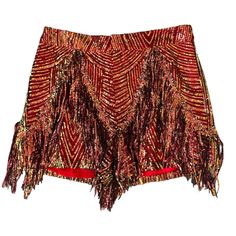 Shimmy the night away in our fringetastic, sequinned rust shorts! Our Any Old Iron Rust Shorts are everything a sparkly person could dream of. Overloaded with sequins and fringe, these shorts are sure to capture, not only the light, but the eyes of those around you! The fire-like shades that dance off the sequins provide depth to the garment and make it even more exquisite. It is the perfect show-stopper! To complete the look, pair the Rust Shorts with our Any Old Iron Rust Jacket! To care for t Iron Wolf, Fringe Shorts, Iron Rust, Painted Shorts, Ibiza Outfits, Rave Fashion, Short Fringe, Sequin Shorts, Red Hot