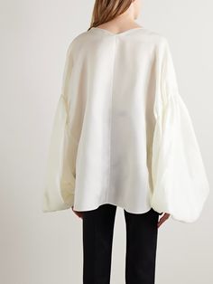 KHAITE Quico oversized silk blouse | NET-A-PORTER Silk Long Sleeve Top With Set-in Sleeves, Silk Blouse With Set-in Long Sleeves, Luxury Silk Tops For Summer, Luxury Satin Tops, Elegant Long Sleeve Blouse With Draped Sleeves, Chic Long Sleeve Satin Top, Luxury Silk Blouse For Summer, Luxury Silk Summer Blouse, Evening Tops With Pleated Lantern Sleeves