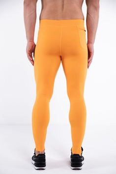 Description: Orange Men’s Workout Leggings Compression Level: Medium to High Bounce-Proof Phone Pocket Zip Pocket For Cash & Keys Sweat-wicking Poly / Spandex with 4-Way Stretch Ergonomic Waistband Adjustable Drawstring Reinforced Stitching & Flat Seams Embroidered Bolt Logo Machine Wash Cold, Quick Drying Model is 6’2’’ (189cm) tall, 34’’ (86cm) waist size and wears size Large. Fitted Orange Moisture-wicking Bottoms, Breathable Orange Sports Bottoms, Orange Breathable Sports Bottoms, Breathable Orange Gym Bottoms, Orange Breathable Gym Bottoms, Orange Fitted Sports Bottoms, Fitted Orange Sports Bottoms, Moisture-wicking Snug Fit Full Length Bottoms, Orange Sportswear Bottoms For Gym