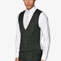 This refined double-breasted waistcoat is tailored slim with an 8-on-2 closure from pure wool. Fitted Double-breasted Three-piece Suit For Semi-formal, Double-breasted Wool Tuxedo For Work, Fitted Double-breasted Tuxedo For Office, Elegant Wool Vest For Office, Formal Fitted Three-piece Suit With Double-breasted Fastening, Fitted Three-piece Suit With Double-breasted Fastening For Formal Occasions, Fitted Double-breasted Tuxedo For Semi-formal Occasions, Semi-formal Double-breasted Fitted Tuxedo, Tailored Double-breasted Three-piece Suit