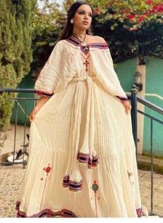 Tradional ethiopian dress fetil kemis Bohemian Style Habesha Kemis Maxi Length, Bohemian Habesha Kemis For Eid, Bohemian White Long Sleeve Habesha Kemis, White Bohemian Long Sleeve Habesha Kemis, Traditional Dress For Eid Vacation, Traditional Long Beige Dress, Traditional Beige Dress For Vacation, Ethiopia Clothing, Eritrean Dress