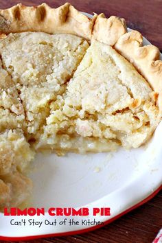 a piece of lemon crumb pie on a white plate with a red border around it