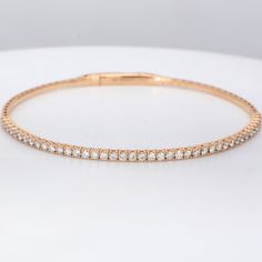 Ninacci 18K Rose Gold Lightweight Oval Diamond Bangle Elegant Brilliant Cut Bangle Bracelet, Elegant Round Bangle For Formal Occasions, Elegant Hand Set Bangle For Anniversary, Elegant Bracelet With Brilliant Cut, Flexible Gold Bracelet For Anniversary, Hand Set Bracelets For Everyday Luxury, Elegant White Gold Bracelet, Elegant Oval Bracelet With Jubilee Detail, Classic Rose Gold Bracelet With Hand Set Details