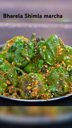 a plate filled with green peppers covered in seasoning