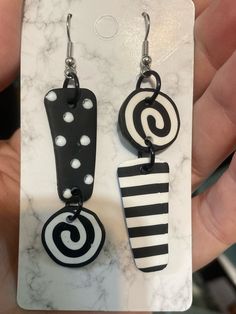 Black and white colors of polymer clay are used to make these whimsical earrings. No paint just clay. No fading or chipping hang about 3" from top of wire. Whimsical White Hand Painted Earrings, Artsy White Earrings With Ear Wire, White Artsy Earrings With Ear Wire, White Polymer Clay Fun Jewelry, White Fun Polymer Clay Earrings, Fun White Polymer Clay Jewelry, White Polymer Clay Jewelry In Fun Style, Hand Painted White Fun Jewelry, Fun Hand Painted White Jewelry