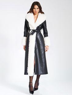 Indulge in opulence with our high quality Zaida White Vegan Fur Trim Vegan Leather Coat. This stunning maxi coat exudes luxury, adorned with puffy fur trim along the neckline and sleeve openings. Crafted from premium vegan leather and soft vegan fur, it is fully lined for comfort. The coat features a large snap inside the center waist, along with belt loops and a slender leather belt for effortless closure. Versatile and chic, it adds a touch of sophisticated glamour to any special occasion. Cho Coat With Fur Trim, Maxi Coat, Maxi Dress Cocktail, Black Vegan, White Faux Fur, Dress With Cardigan, Fur Trim, Black Design, Leather Coat