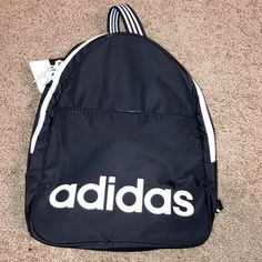 Mini Adidas Backpack/With Tags/Open To Offers On Anything In My Closet Thanks White Adidas Sporty Backpack, Adidas Sporty White Backpack, Adidas White Sporty Backpack, Adidas White Standard Backpack, Trendy White Adidas Bag, Adidas Everyday Bags For Back To School, Trendy Adidas Backpack For Everyday Use, Adidas White Bag For Everyday Use, Adidas Backpack For Everyday And Back To School