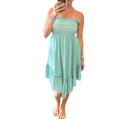 Thanks For Checking Out Our Fabulous Posh Closet!! All Of Our Items Are New With Tags! Never Worn Or Used <3 - Composition: 100% Rayon - Description: The Kind Of Easy And Flattering Dress You'll Be Reaching For All Season Long. This Adorable Piece Features A Stunning Dusty Teal Color And Beautiful Stitch Work, Offering Versatility As Both A Maxi Skirt And A Mini Dress. The Smocked Bodice And Waist Provide Excellent Stretch, While The Relaxed Fit Ensures Comfort. Made From 100% Rayon, It's A True Blue Smocked Tiered Skirt Dress For Summer, Blue Tiered Skirt Smocked Dress For Summer, Strapless Smocked Beach Dress For Summer, Strapless Smocked Dress For Beach In Summer, Strapless Smocked Dress For Summer Beach, Spring Dress With Smocked Bodice And Skirted Shape, Spring Dress With Smocked Bodice, Tiered Smocked Dress For Beach In Summer, Tiered Smocked Dress For Summer Beach