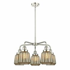 three light chandelier with glass shades on the bottom and one light fixture above it