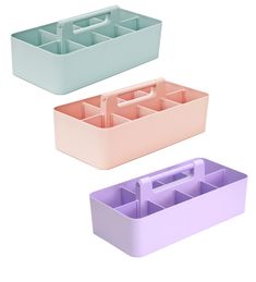 three different colored plastic containers with dividers