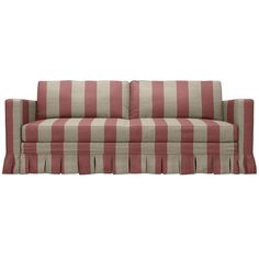 a red and white striped couch sitting on top of a wooden floor