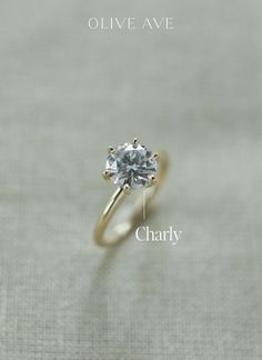 an image of a diamond ring with the name olive ave on it and chart below