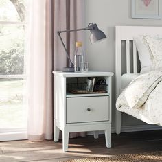 a bedroom scene with focus on the nightstand