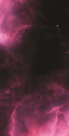 the night sky is filled with stars and pink clouds, as well as purple hues