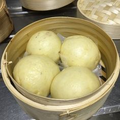 some food is in a bowl on the stove top and ready to be put into the oven