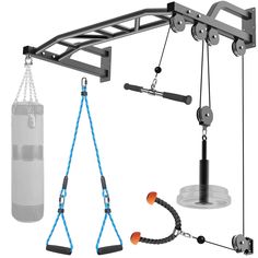 an image of a gym equipment set up with ropes and punching gloves hanging from the ceiling