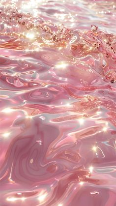 the water is pink and has bubbles on it