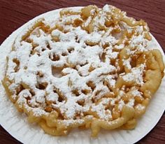 a pastry with powdered sugar on top