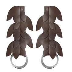 PRICES MAY VARY. Authentic Medieval Style: This leather leaf skirt hikes set is suitable for Renaissance fairs, cosplay events, and historical reenactments Versatile Ren Fairs Accessories: The skirt hikes features intricate leaf-shaped panels that cascade down in layers, creating a mesmerizing silhouette, allowing for comfortable movement Sturdy Construction: Crafted from quality leather, this skirt hike belt is built to withstand wear and tear Easy to Wear: Just clipping your skirt onto the two rings, these practical hikes can get your medieval costume dress up, and keep the hem from dragging on the mud floor Package List: Includes a set of 2 skirt hikes, if you have any questions, just let me know Step back in time and feel the medieval era with this exquisite leather leaf skirt hikes, s Dress Armor, Leaf Skirt, Flowing Blouse, Leather Leaf, Historical Reenactment, Medieval Costume, Medieval Fashion, Woodland Creatures, Costume Dress