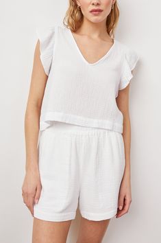 MILEY-WHITE-FRONT Breezy Relaxed Fit V-neck Tops, Breezy V-neck Tops With Relaxed Fit, Breezy Relaxed Fit Top For Loungewear, Breezy Tops With Relaxed Fit For Loungewear, Chic Cropped Tops For Loungewear, Breezy Relaxed Fit Tops For Daywear, White Breezy Top For Day Out, Breezy Tops With Relaxed Fit For Daywear, White Cropped Top For Loungewear