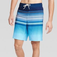 Get ready for exciting sunny escapades in style and comfort with these Suspension Striped Swim Shorts from Goodfellow & Co™. The regular-fit swim shorts are made from soft and stretchy fabric with a boxer brief liner for added comfort both in and out of the water. The swim trunks feature an adjustable drawstring closure that helps you find the best fit, along with side and back pockets that allow you to carry your essentials. Featuring an allover striped pattern for cool style, simply pair them Casual Moisture-wicking Bottoms For Beach Season, Blue Sports Bottoms For Beach Season, Casual Blue Shorts For Warm Weather, Blue Bottoms For Warm Weather With Short Length, Relaxed Fit Moisture-wicking Bottoms For Beach, Blue Shorts For Warm Weather, Blue Short-length Bottoms For Warm Weather, Moisture-wicking Bottoms For Poolside In Spring, Bermuda Sports Bottoms For Summer